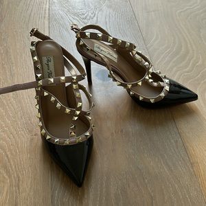 Black pointed toe high heel with gold rockstud. New never worn.
